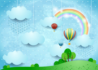 Fantasy landscape with rain and hot air balloons
