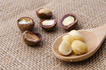 macadamia nuts in a wood spoon