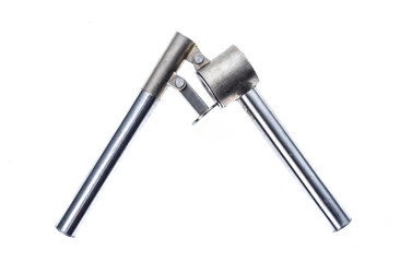 Stainless steel garlic crusher or press for garlic and herbs.