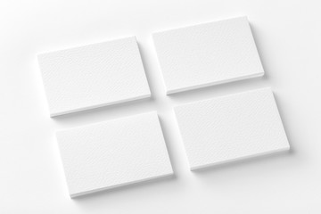 Mockup of business cards stacks at white background.