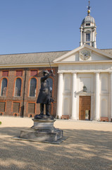 Front of Royal Chelsea Hospital with pensioner statue in foreground