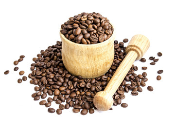 Fried coffee beans in a wooden container