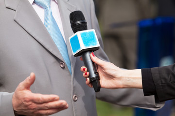 Media interview. Microphone. Journalism.