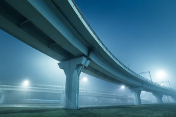 Fototapeta premium Large elevated traffic highway at sunset