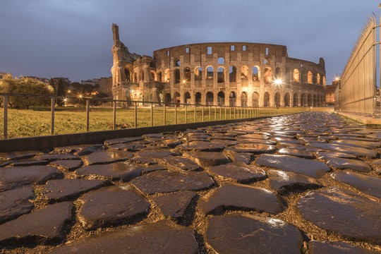 Dusk lights on the Colosseum, the old Flavian Amphitheatre, and symbol of the city, Rome, Lazio