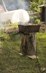 Russian barbecue outdoors. A brazier with meat.