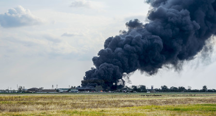 Fototapeta na wymiar Huge smoke clouds after explosion