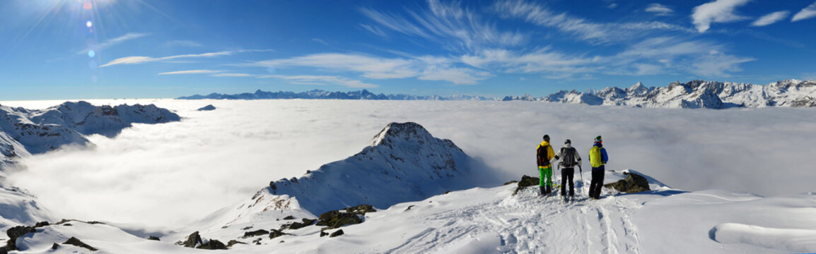 ski mountaineer with sea of clouds, Tr&Atilde;&copy;care peack, Valtournenche, Aosta Valley, Italy