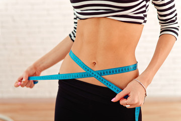 Sports female waist with a beautiful press coiled meter
