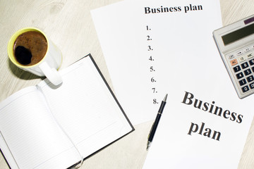 An inscription of the business plan, execution points, there is a calculator next to it