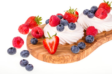 Pavlovas on olive wood board