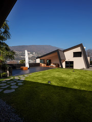 Modern villa, exterior with lawn, nobody