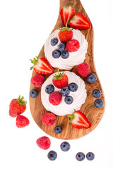 Pavlovas on olive wood board