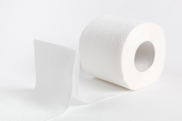 Roll of toilet paper on white background
