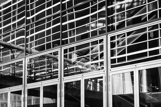 Black and White fascade of Office building with reflections in the windows
