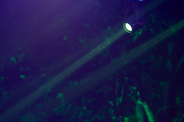 Beam of blue light on black . Applied to a searchlight torch