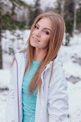 Winter portrait of young beautiful woman