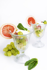 Fruit salad with mint and sour cream