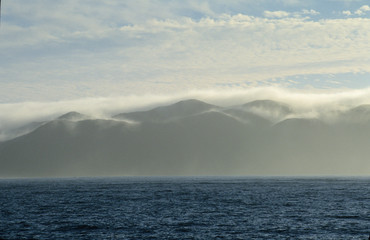 Coastal fog comes over the mountains of Northern Baja Mexico