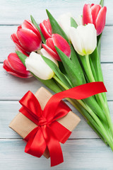 White and red tulips and gift box