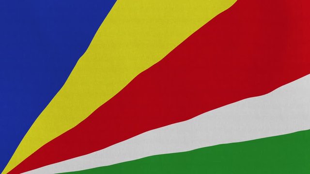 Loopable: Flag of Seychelles...Seychellois official flag gently waving in the wind. Highly detailed fabric texture for 4K resolution. 15 seconds loop.