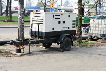Electric diesel mobile trailer generator. Use a mobile diesel generator with the repair of the road.