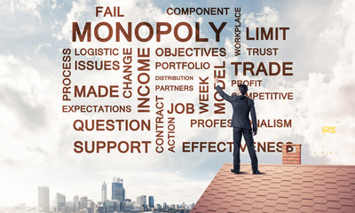 Young businessman standing on house roof and writing leadership 