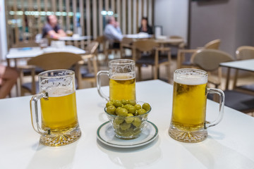 glass of beer in the cafeteria closeup