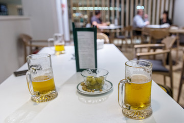 glass of beer in the cafeteria closeup
