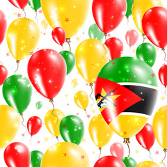 Mozambique Independence Day Seamless Pattern. Flying Rubber Balloons in Colors of the Mozambican Flag. Happy Mozambique Day Patriotic Card with Balloons, Stars and Sparkles.