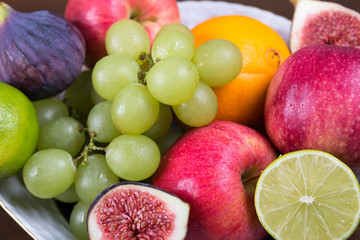 Naklejka na ściany i meble Assortment fruits on wooden table