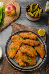 Breaded original schnitzel with waldorf salad