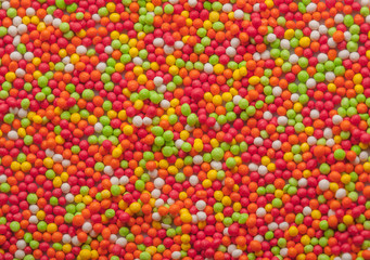 many colored little candies green red white