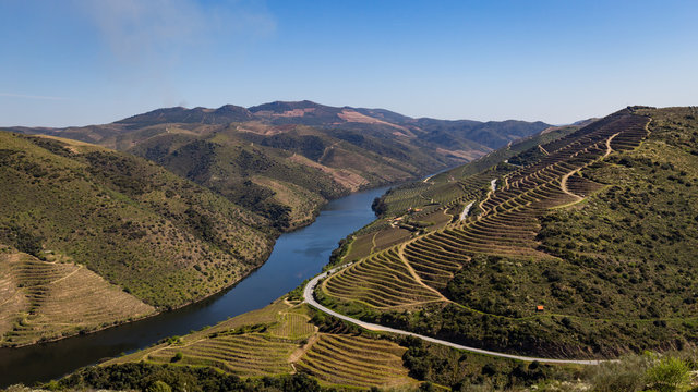 The C&ocirc;a River at Vila Nova de Foz C&ocirc;a, Portugal, against blue sky