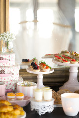 Brunch Buffet Service, mini raspberry and caviar pies.