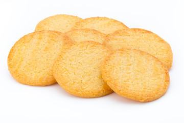 Stacked short pastry cookies isolated on white background.