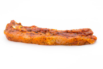 Spicy marinated spare ribs barbecued on the white background.