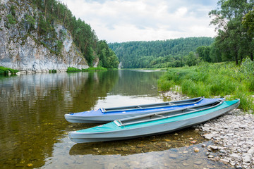 Fototapeta na wymiar kayak Urral Mountains landscape along white river