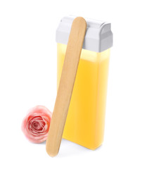 Liposoluble wax cartridge, wooden stick and flower on white background