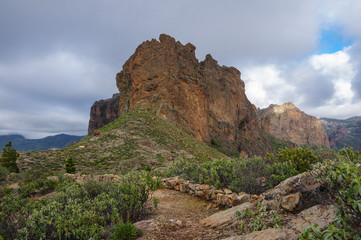 Fototapeta na wymiar Mountain landscape with high rock in Gran Canaria near El Junkal