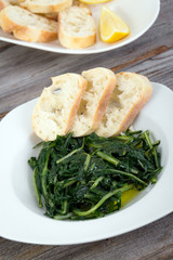 prepared boiled dandelion leaf green