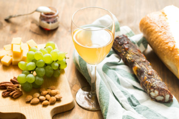 Snacks for wine: grapes, cheese, nuts