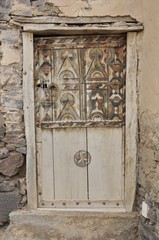 Half painted old wooden berber door