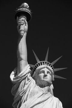 Fototapeta Statue of Liberty, black and white with black sky in New York