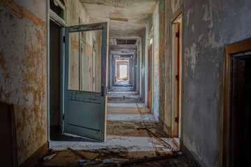 Old abandoned architecture broken down urban decay hazards incluing broken glass and building...
