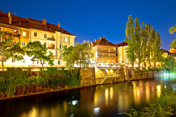 Fototapeta na wymiar Ljubljanica river waterfront in Ljubljana evening view