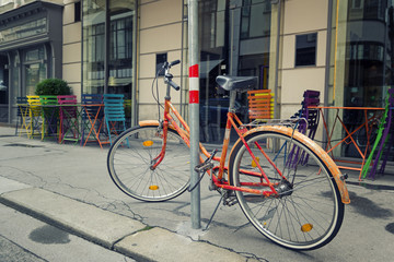 Fototapeta na wymiar Bicycle Parked At Street, Vienna, Austria