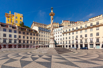 Town Hall Square with a beautiful geometric mosaic in Lisbon, Portugal. In the center of the square...