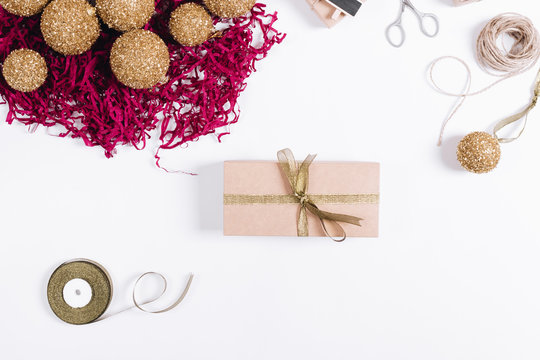 Gifts in boxes, balls and other decorations on a white background