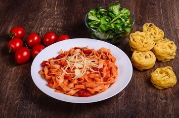 Vegetable paste. Tagliatelle with tomatoes